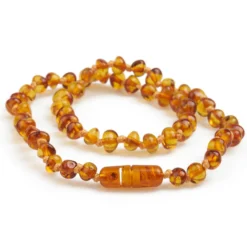 Baby Bernsteinkette rund cognac