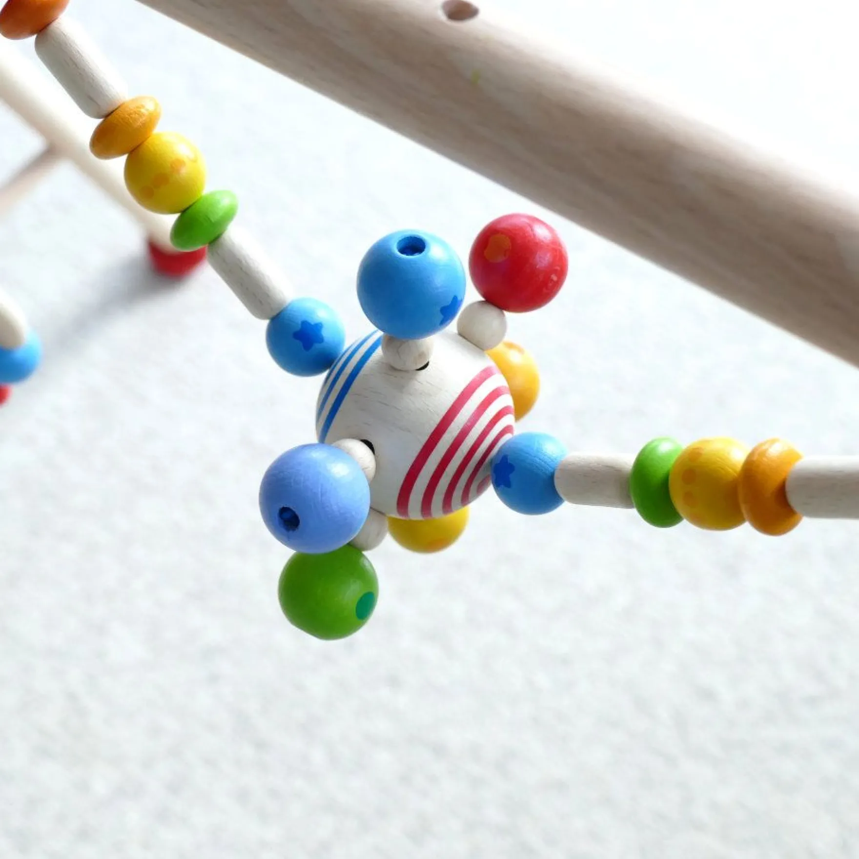 Spieltrapez Holz Regenbogen